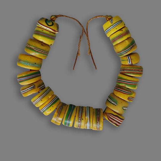 6 inch strand of 22 matched antique Venetian beads from the African trade.  13-14mm diameter. b1-2039cs