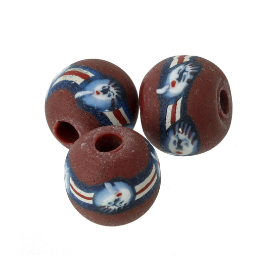 Ancient Roman era face bead reproduction. 21mm.  Indonesia . Pkg. 1. b1-2076