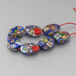 Vintage Murano Moretti studio millefiori glass flat oval beads. 1920s. 17.5x13.5x7mm. Strand of 7.  B1-2104