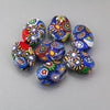Vintage Murano Moretti studio millefiori glass flat oval beads. 1920s. 17.5x13.5x7mm. Strand of 7.  B1-2104