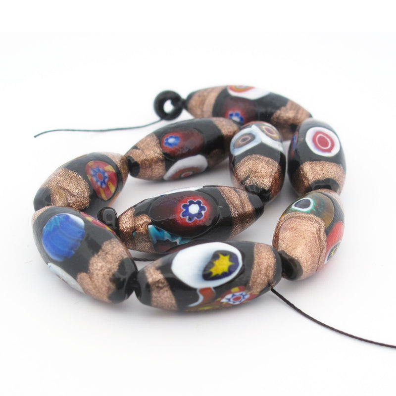 Venetian oval millefiori glass beads, with metallic aventurina stripes. 9 beads, Pkg1 Str. b1-3004