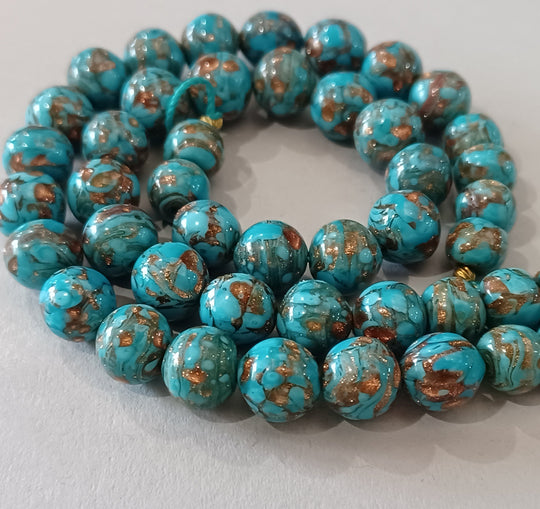 Turquoise glass lampwork beads with aventurina. 1950s Murano. 7" strand. b1-649