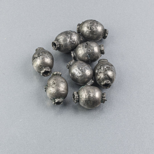 Vintage ethnic hand made silver metal beads.  Pkg. 10. 13.5x8.75mm . b18-695