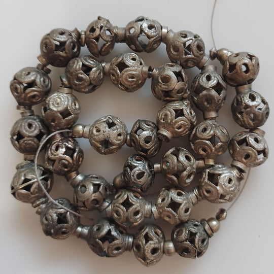 Vintage hand made silver metal hollow open work beads.  Strand 15.  India . b18-697