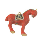 Vintage red cinnabar horse pendant with a black cloisonné enamel saddle. b2-930