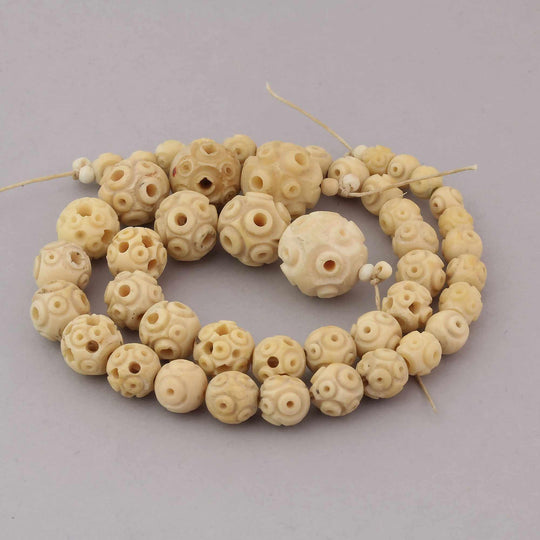 Art Deco Chinese export hand carved bovine bone beads, from 6mm to 14mm.  1920s-30s. b3-bo204