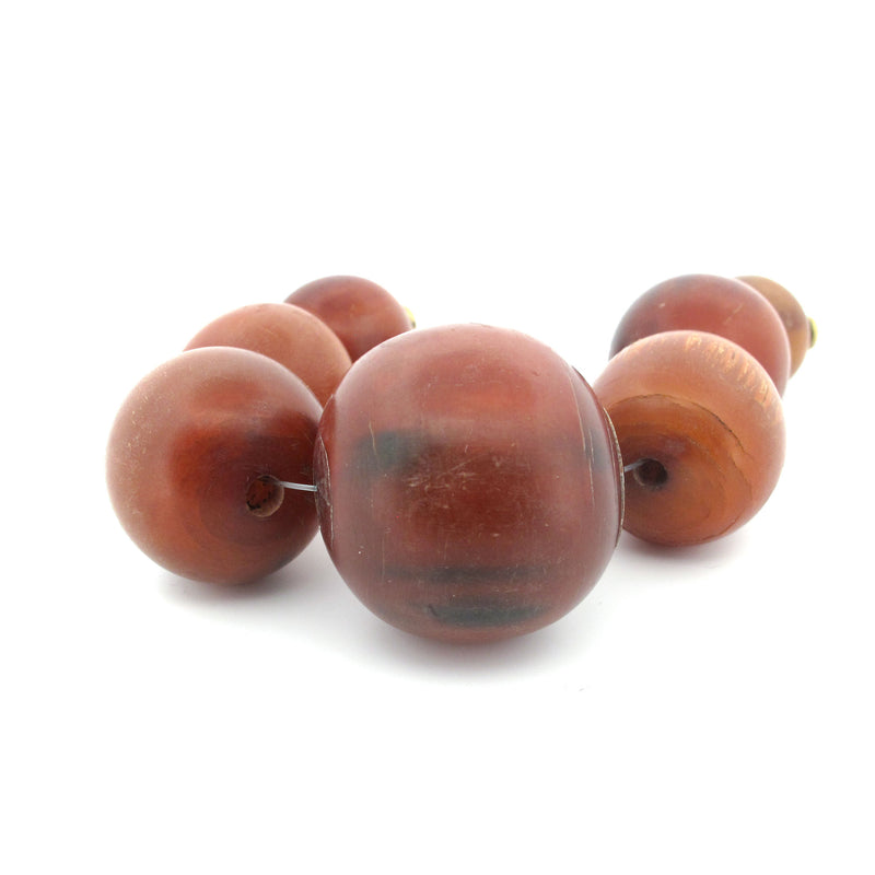 Vintage horn trade beads from West Africa.  Graduated strand of 7. 16 to 29mm. b3-ho28a
