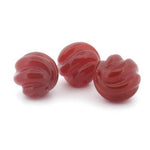 Carnelian carved swirled melon bead.  9.5 - 10mm. Pkg 4. b4-car395