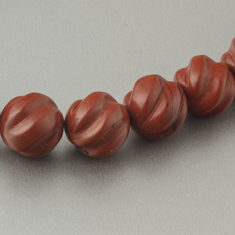 Red Jasper carved swirled melon bead.  12mm. Pkg 4. b4-jas293