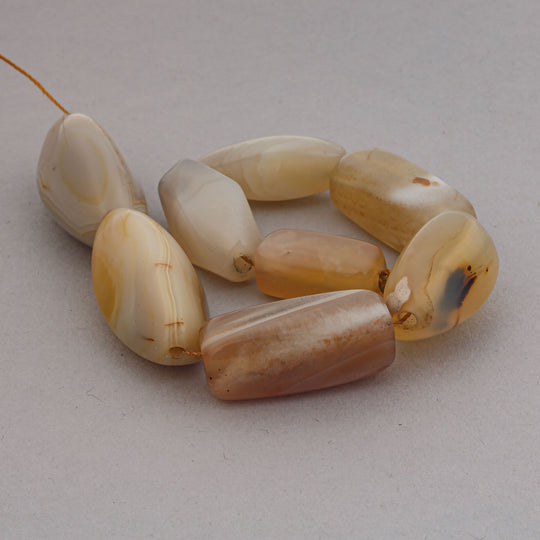 8 old carnelian and agate beggar beads from India. 8.5" strand.  B4-aga288