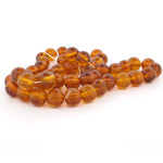 Genuine natural Baltic amber round bead.  9mm. Pkg 4. B4-amb120