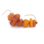 Antique Baltic amber free form beads 15mm to 32mm. Str. 9 beads. b4-amb121