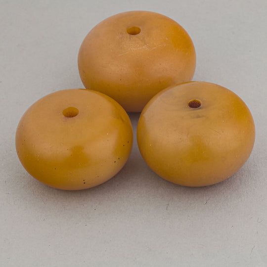 3 old Phenolic resin "African Amber" disk beads from the African trade.  b4-amb146