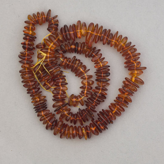 Vintage Baltic Amber  18.5" strand of Cognac Baltic Amber smooth polished flat freeform beads. b4-amb147