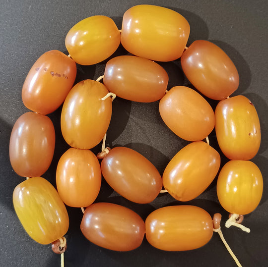 8 oval Phenolic resin "African Amber" beads from the African trade.  b4-amb151