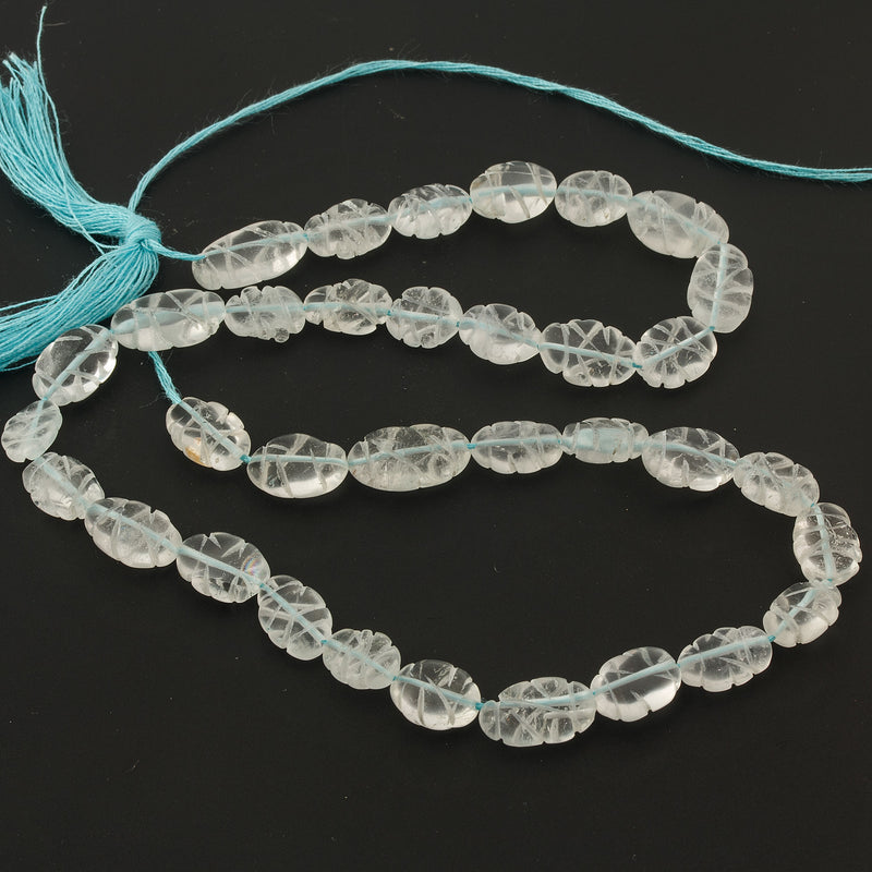 Carved Aquamarine Oval Beads, 15 inch strand. b4-aqu150