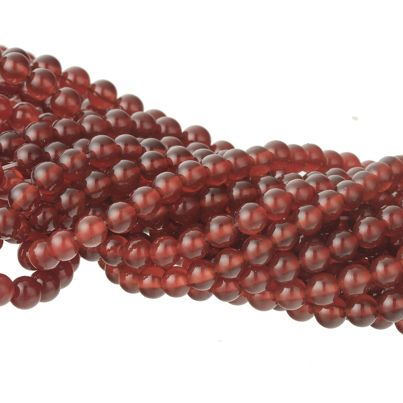 16 inch strand of 4mm carnelian beads. Good color, good quality. b4-car392
