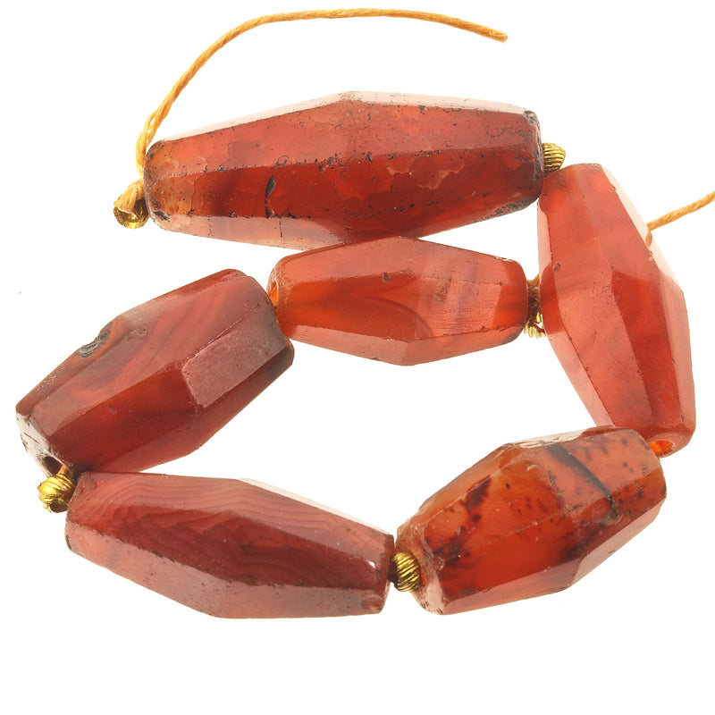 19th century faceted carnelian agate trade beads, cut in Germany, traded in Africa. 1 Str.-6 beads. b4-car409