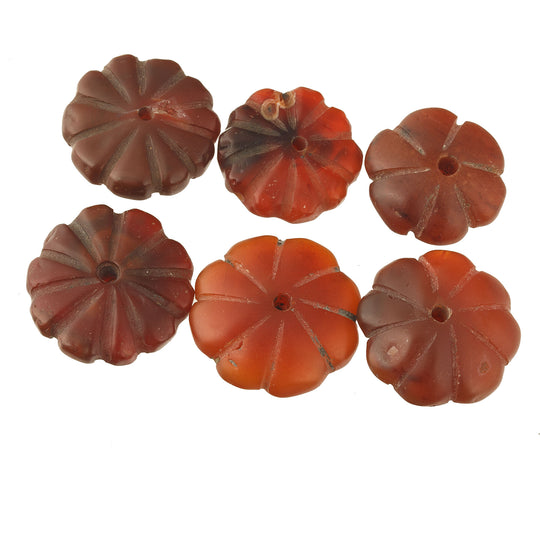 Carnelian carved flower flat disk beads. Pkg 6. b4-car423