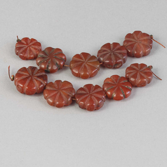 Old opaque carnelian carved flat fluted flower beads.  Strand of 5.  Nepal.  B4-car427
