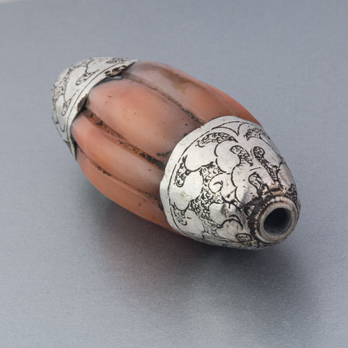 Old Tibetan agate melon bead, silver repoussé caps.  61.5mm x 28mm, Pkg 1. b4-car430
