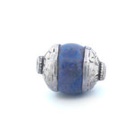 Antique Tibetan carved lapis bead with repousse sterling silver caps. 22-24x16-18mm. Pkg 1. b4-lap294