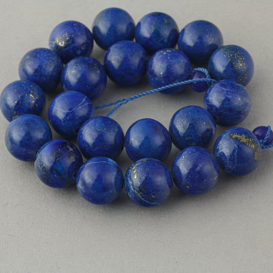 Vintage natural lapis lazuli 10mm rounds. AA quality. 8" inch strand. 21 beads. b4-lap308