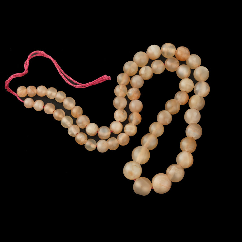 Moonstone beads, translucent peach rounds,Graduated 18" Str. Pkg 1. b4-moo220