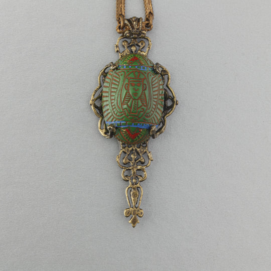 Egyptian Revival vintage Czech pressed glass and stamped brass filigree pendant. b5-555pd
