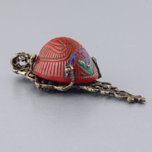 Egyptian Revival vintage Czech pressed glass and stamped brass filigree pendant. b5-556pd