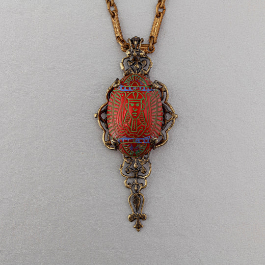 Egyptian Revival vintage Czech pressed glass and stamped brass filigree pendant. b5-556pd