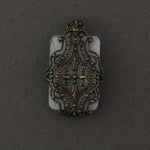 1920s Czechoslovakia pressed Jade glass and brass filigree pendant. 25x16mm.  b5-562pd