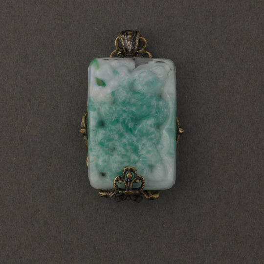 1920s Czechoslovakia pressed Jade glass and brass filigree pendant. 25x16mm.  b5-562pd