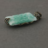 1920s Czechoslovakia pressed Jade glass and brass filigree pendant. 25x16mm.  b5-562pd