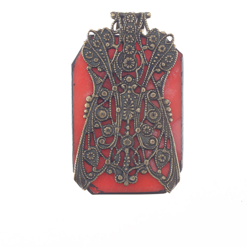 Vintage Bohemia "carved" pressed coral  glass and stamped brass filigree pendant. b5-592pd