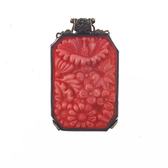 Vintage Bohemia "carved" pressed coral  glass and stamped brass filigree pendant. b5-592pd