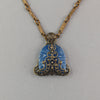 Pendant of 1920s Art Deco blue Bohemian blue glass stone wrapped in vintage brass filiigree. b5-747pd