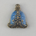 Pendant of 1920s Art Deco blue Bohemian blue glass stone wrapped in vintage brass filiigree. b5-747pd