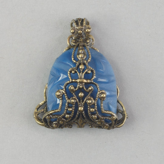 Pendant of 1920s Art Deco blue Bohemian blue glass stone wrapped in vintage brass filiigree. b5-747pd