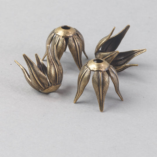 Oxidized brass textured leaf style bead cap. 12mm petal. Pkg of 4. b9-2248
