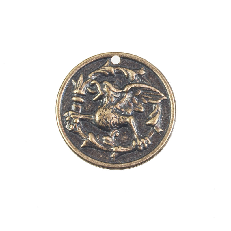 stamped brass gryphon medallion