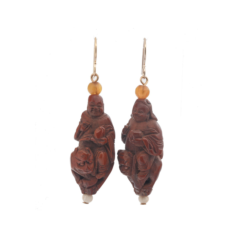 Superb pair of vintage Chinese carved Hedaio fruit pit beads earrings. j-eror505