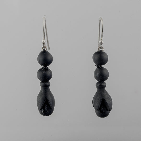 Earrings of antique 19th century carved Whitby jet beads.  ervc676