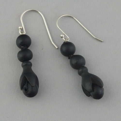 Earrings of antique 19th century carved Whitby jet beads.  ervc676