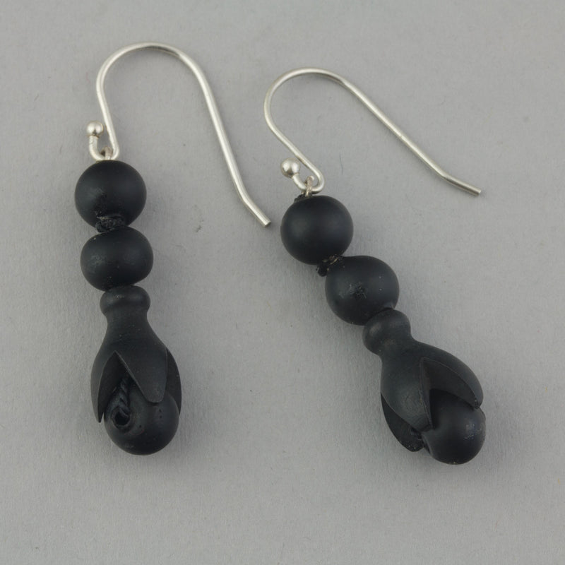 Earrings of antique 19th century carved Whitby jet beads.  ervc676