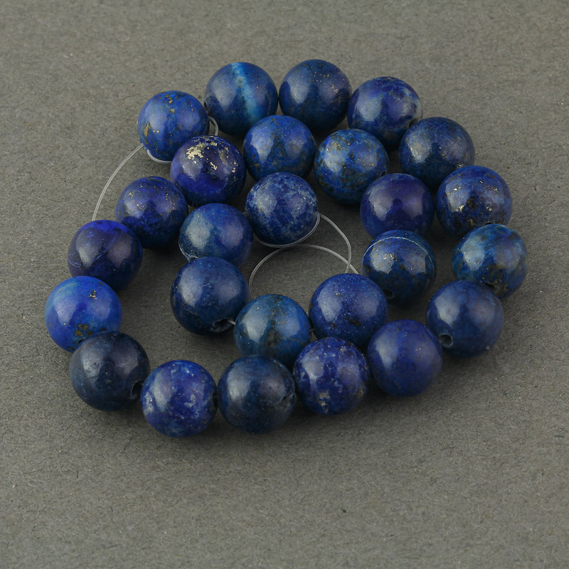 Vintage natural lapis lazuli 8mm rounds. 8" inch strand. 26 beads. b4-lap307