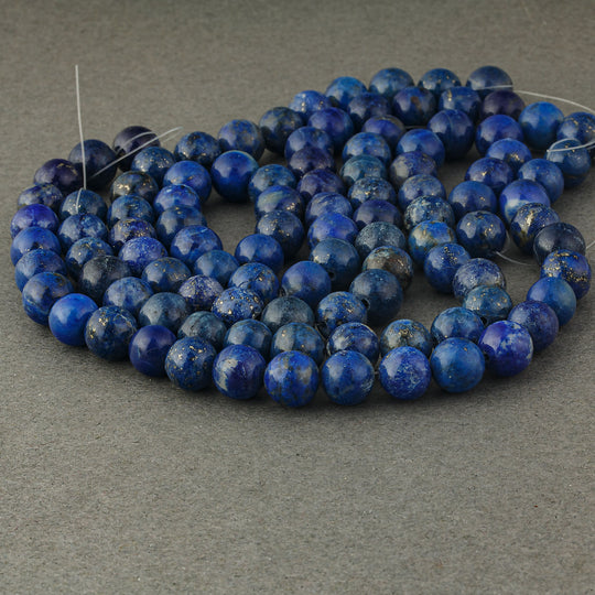 Vintage natural lapis lazuli 8mm rounds. 8" inch strand. 26 beads. b4-lap307