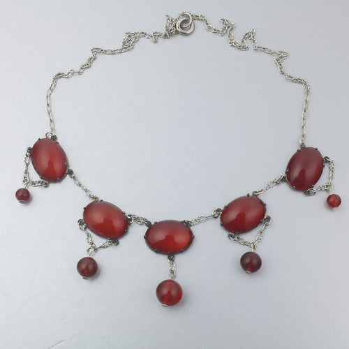 Art Deco style necklace of prong set Carnelian stone links and silver chain. nlad1000