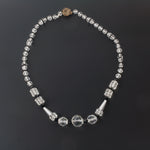 Art Deco 1920’s graduated crystal bead with black glass accents. j-nlad989