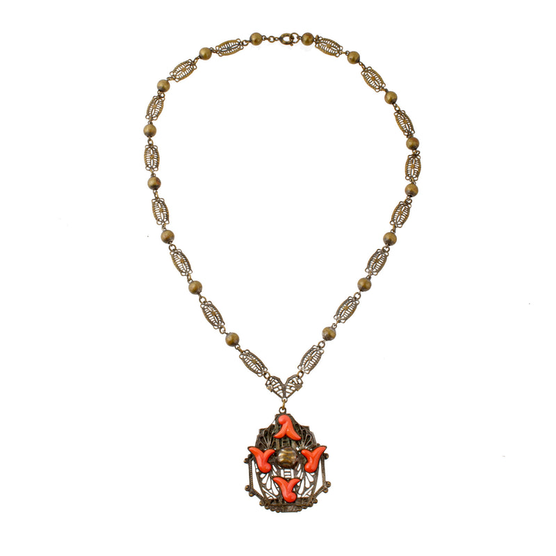 Neiger Brothers red coral glass and brass filigree lavaliere necklace c. 1930's. j-nlbg2076
